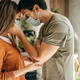 Image for article titled Couple Who Met During Pandemic Tenderly Remove Each Other’s Mask Straps For First Time